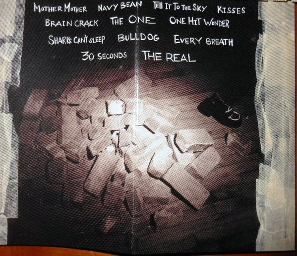 http://tracybonham.misterlinks.net/images/burdensofbeingupright-cassette-back.jpg