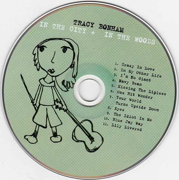 http://tracybonham.misterlinks.net/images/inthecity-inthewoods.disc.jpg
